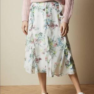 Ted Baker Lurissa Pergola Floral
Ruffled Skirt Size 4